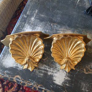 Pair of vintage Italian hand carved Hollywood Regency wall shelves.